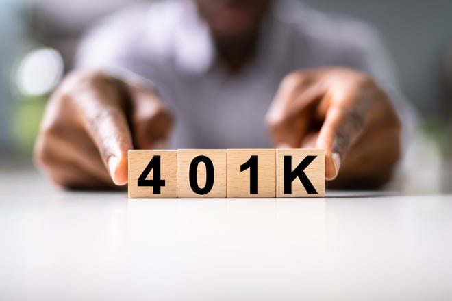 "401K" written on four wooden blocks.
