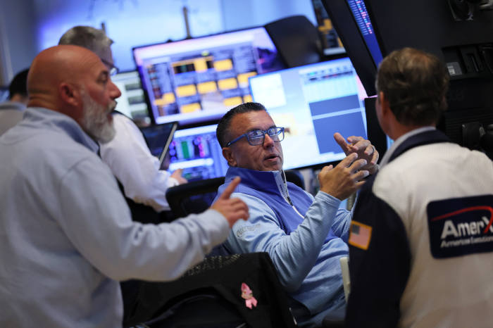 Traders working on the floor of the New York Stock Exchange.