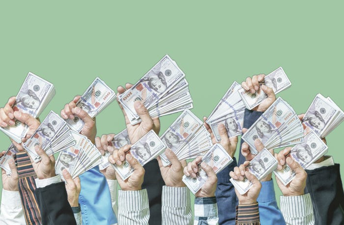 Hands holding up dollars on a green background.
