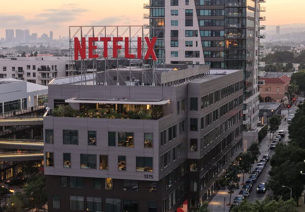 An aerial view of the Netflix logo displayed above corporate offices.