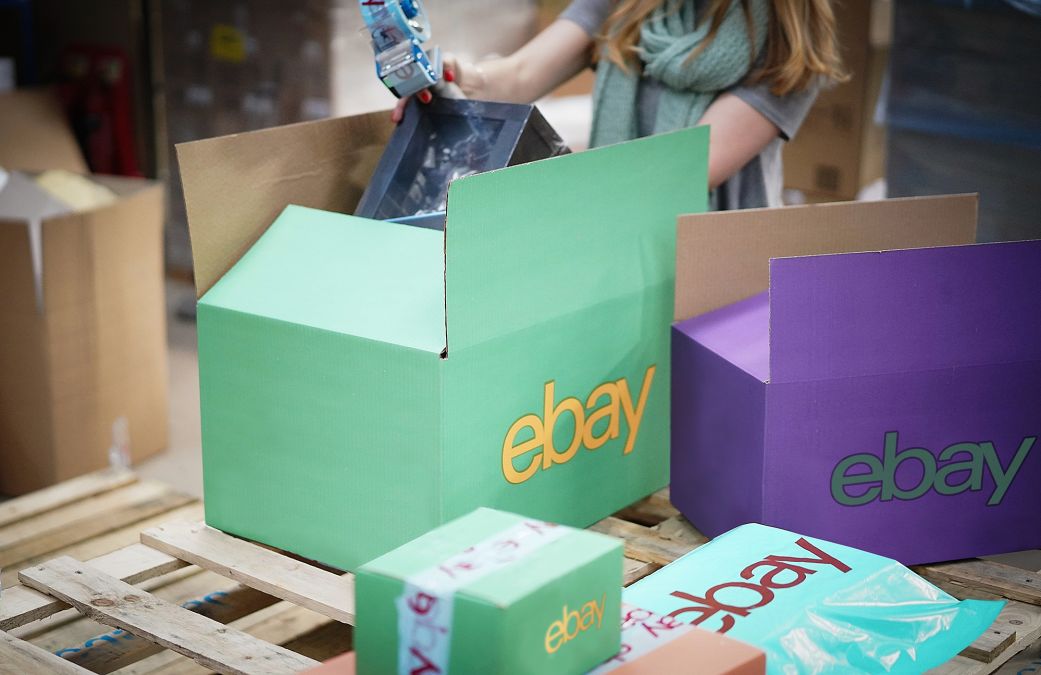 An eBay delivery is prepared for shipping at an eBay seller warehouse on April 5 in London. eBay is using AI to make it easier to sell and buy products on the site.