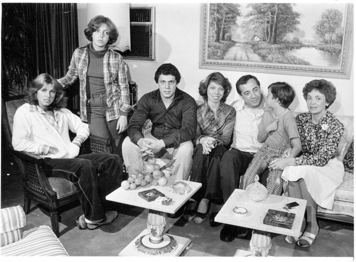 Mario Cuomo and his family (Maria, Madeline, Andrew, Margaret, Christopher, and Matilda) posing for a photo in their home.