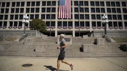 A large US flag is seen on the facade of the Department of Labor headquarters building in Washington DC, on September 8.