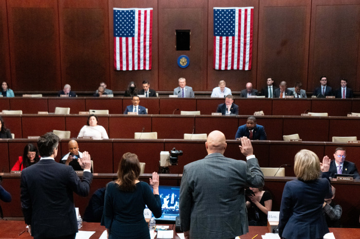 Witnesses are sworn in at a House Oversight and Government Reform Committee hearing in the U.S. Capitol.