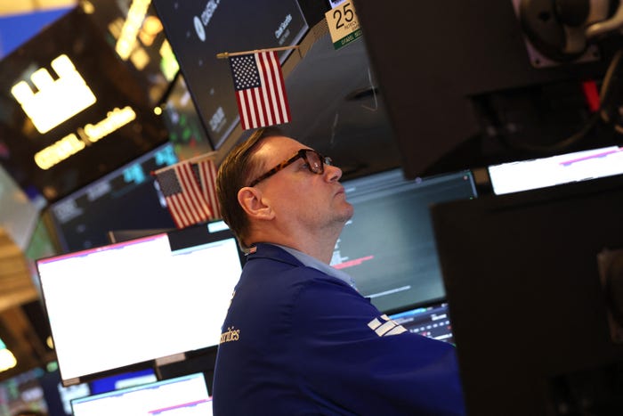 A trader works on the floor of the New York Stock Exchange
