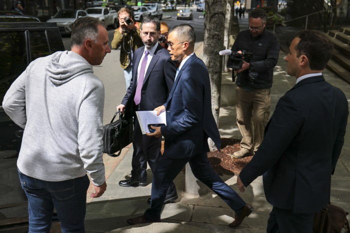 Former Binance CEO Changpeng Zhao departing federal court.