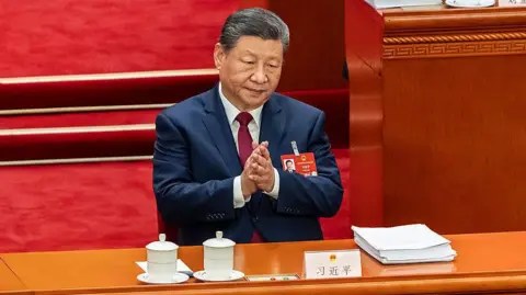 Getty Images Xi Jinping, China's president, attends the opening session of the National People's Congress at the Great Hall of People in Beijing, China
