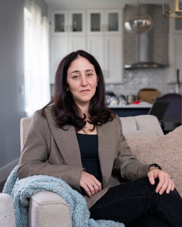 Eryn Schultz sitting in her home.