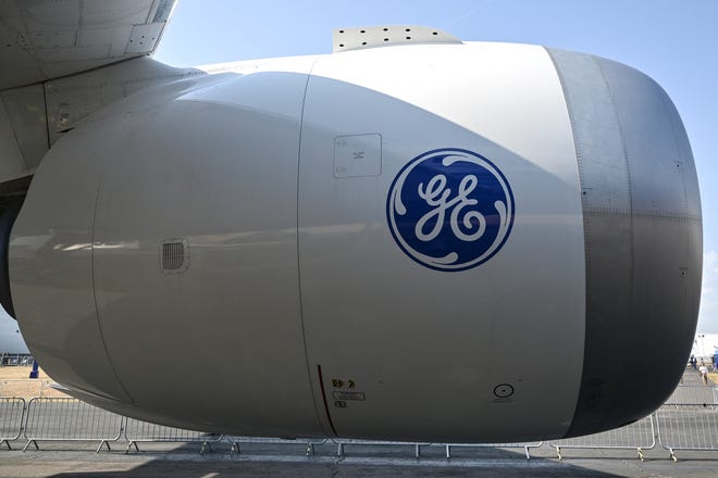 A photograph taken on July 18, 2022 shows the GE9X General Electric Engine on the Boeing 777 during the Farnborough Airshow.