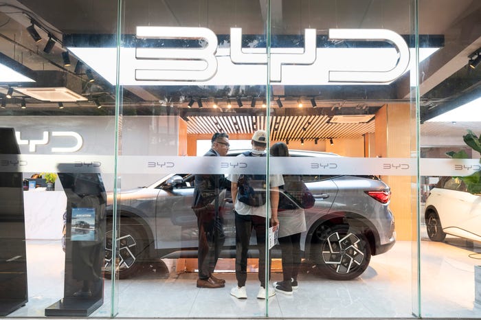 2025/10/13: Shoppers are seen at the Chinese automaker BYD official authorized car dealer store displays its Seal car model in Hong Kong. (Photo by Sebastian Ng/SOPA Images/LightRocket via Getty Images)