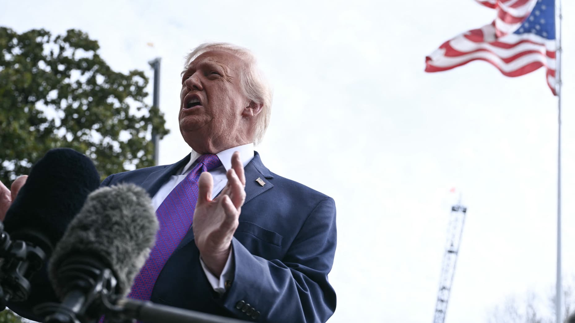 US President Donald Trump speaks to reporters before boarding Marine One as he departs from the South Lawn of the White House in Washington, DC, on March 11, 2026. Trump will be making multiple stops in Kentucky and Ohio including Thermo Fisher Scientific and Verst Logistics. (Photo by Brendan SMIALOWSKI / AFP via Getty Images)